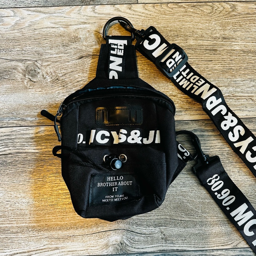 black 80.90  MCYS&JI  limited Edition crossbody sling bag.